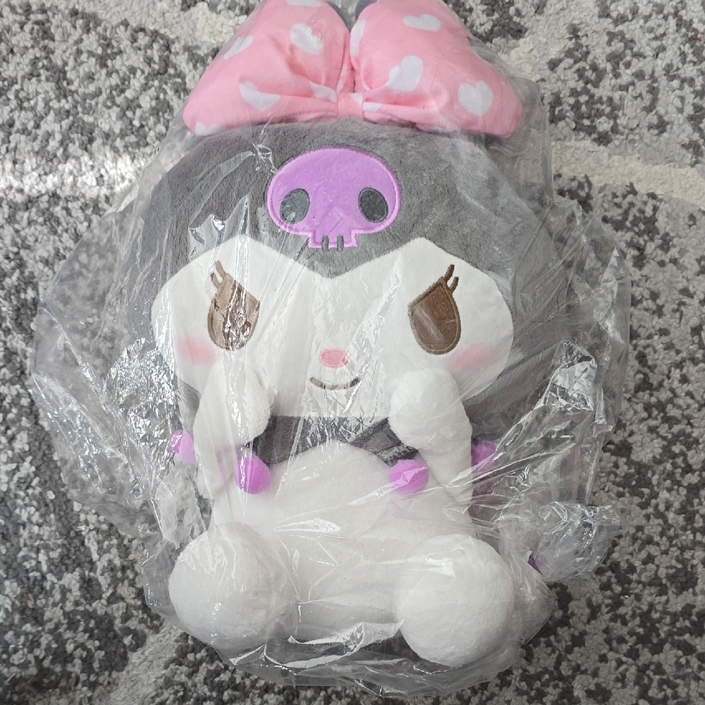 Skull-Themed Plush Toy with Pink Bow